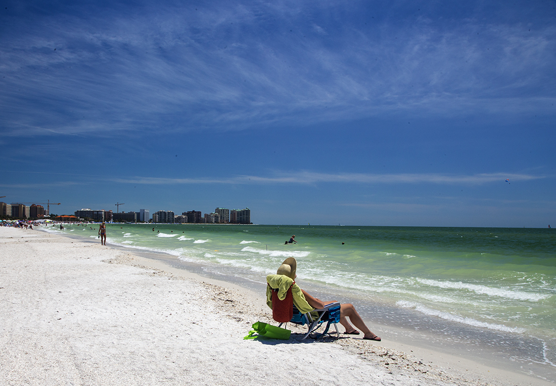 A seat in the sun with your toes in the Gulf  on Marco's beautiful beach